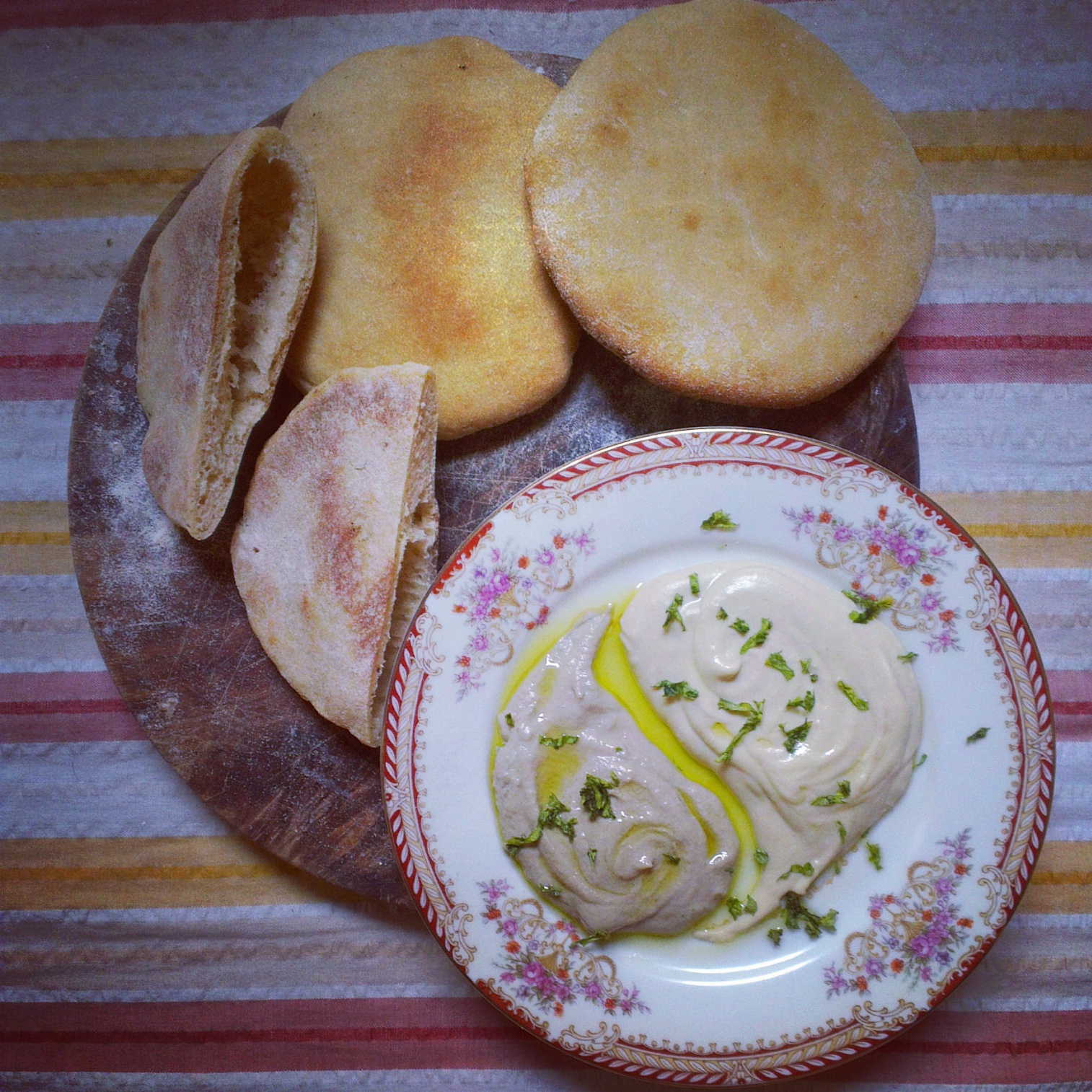 Golden home made Pita, with ultra smooth hummus and Baba Ganoush